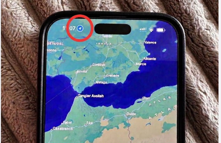 Que signifie le point bleu en haut de votre iPhone ?